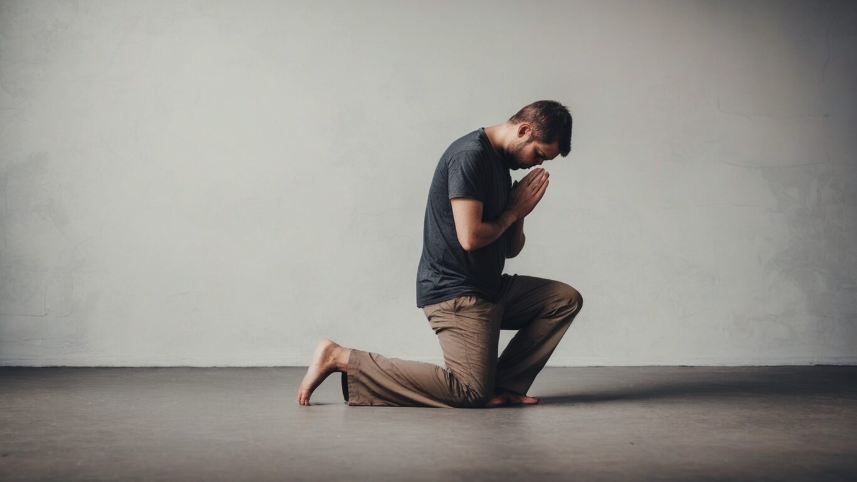 Man in his knees praying